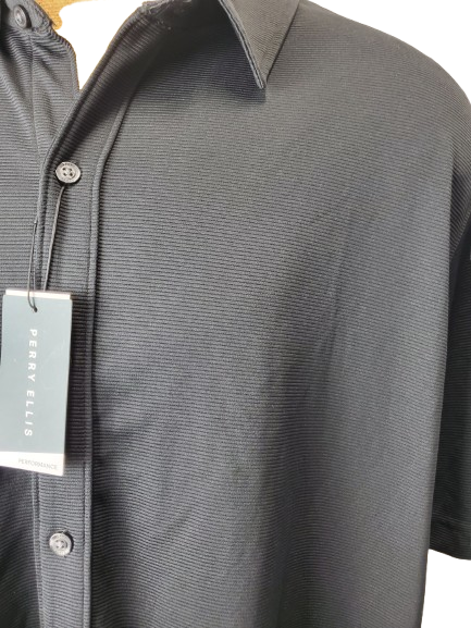 black polo shirt with a tag on a white background