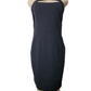 Black dress on a mannequin against a white background
