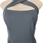 Black sleeveless top with criss-cross front on a mannequin against a white background