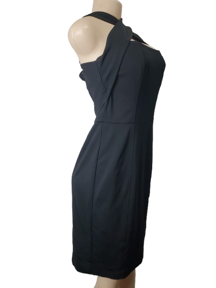 Black dress on a mannequin against a white background