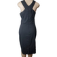 Black dress on a mannequin against a white background