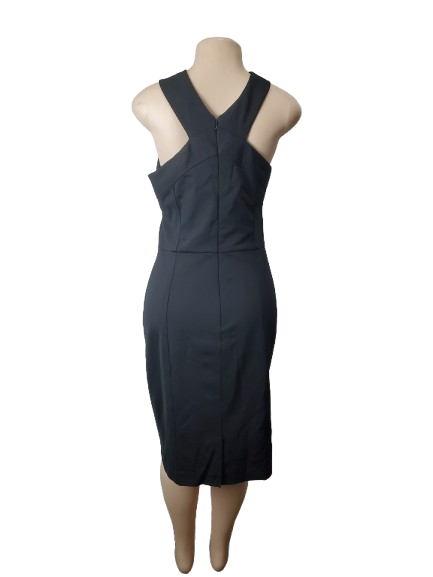 Black dress on a mannequin against a white background