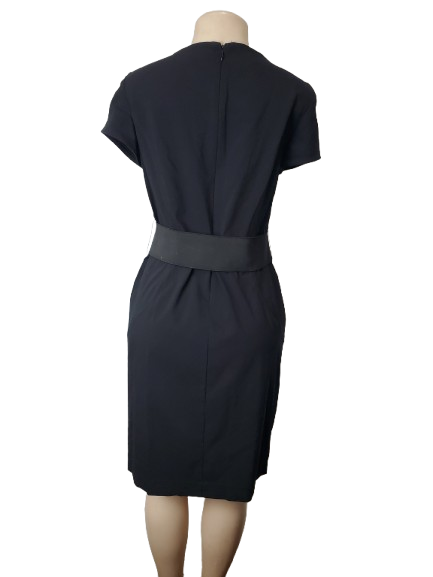 Black dress on a mannequin with a white background