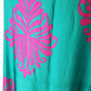 green fabric with pink floral patterns