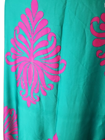 green fabric with pink floral patterns