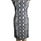 Black and white patterned dress on a mannequin against a white background