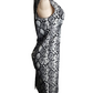 Black and white patterned dress on a mannequin against a white background