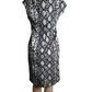 Black and white patterned dress on a mannequin against a white background