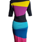 Colorful dress with black, yellow, purple, blue, and pink stripes on a mannequin against a white background.