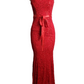 Red lace evening gown with a belt on a mannequin against a white background