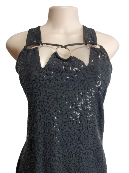 Black sequin dress on a mannequin against a white background