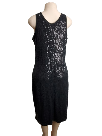 Black sequin dress on a mannequin against a white background