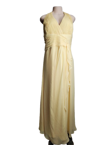 Yellow evening gown on a mannequin against a white background