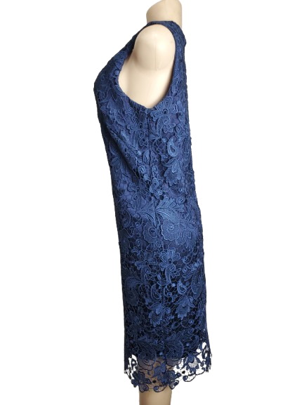 Blue lace dress on a mannequin against a white background