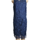 Blue lace dress on a mannequin against a white background