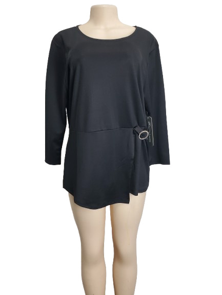 Black blouse on a mannequin against a white background