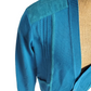 Blue cardigan on a mannequin with a white background