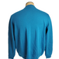 Blue sweater on a mannequin against a white background