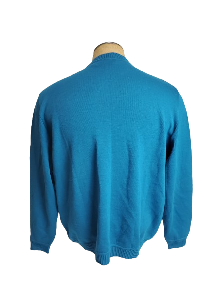 Blue sweater on a mannequin against a white background