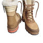 Pair of brown winter boots with white fur lining on a white background