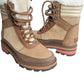 Pair of brown winter boots with white fur lining on a white background