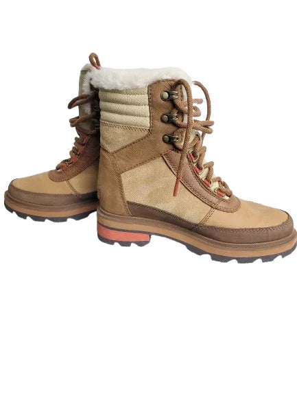 Pair of brown winter boots with fur lining on a white background