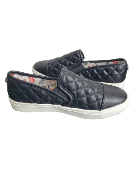 Pair of black quilted slip-on shoes on a white background