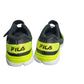 Pair of black and neon green Fila shoes on a white background
