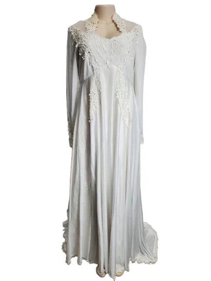 White lace dress on a mannequin against a white background