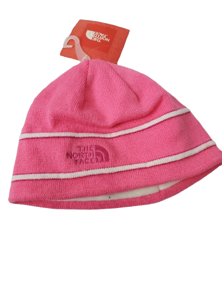 Pink knit beanie with white stripes and a brand tag on a white background