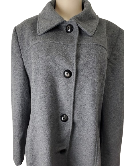 Gray coat with button details on a mannequin against a white background