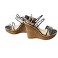 Pair of wedge sandals with cork sole on a white background