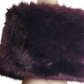 burgundy fur shrug on a mannequin against a white background