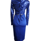 Blue sequin dress on a mannequin against a white background