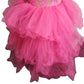 Pink tutu dress with gold sequin top on a white background