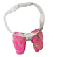 Pink sequin bow with a white bow tie on a white background