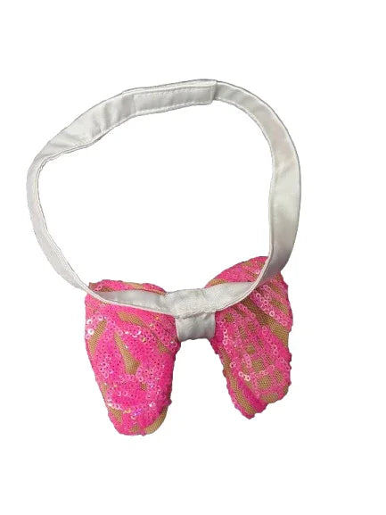 Pink sequin bow with a white bow tie on a white background