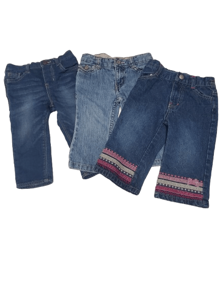 Three pairs of blue jeans with patterned accents on a white background