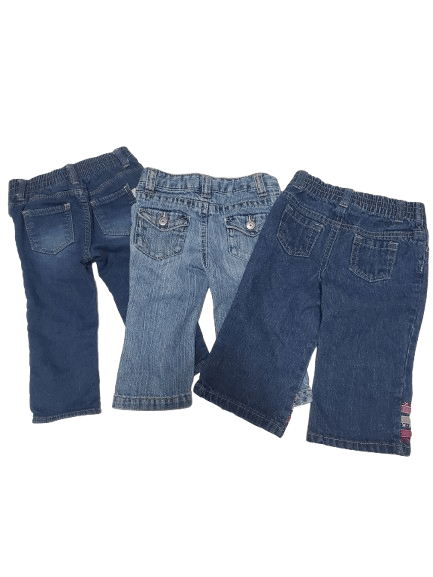 Three pairs of blue jeans on a white background