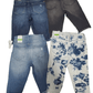 Four pairs of jeans shorts in different styles and colors on a white background