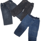 Three pairs of blue jeans, one dark and one light, on a white background