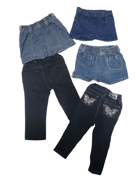 Set of blue and black jeans on a white background