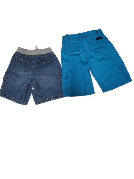 Two pairs of shorts, one blue and one denim, on a white background