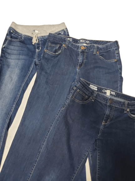 Pair of blue jeans with white stripes on a white background