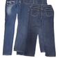 Three pairs of blue jeans stacked on a white background