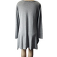 Gray top on a mannequin against a white background
