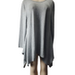 Gray sweater on a mannequin against a white background