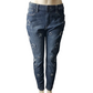 Blue jeans with star patterns on a mannequin against a white background