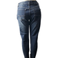 Blue jeans on a mannequin against a white background