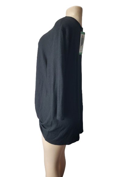 Black sweater on a mannequin with a white background